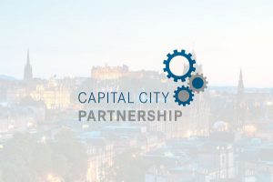 Capital City Partnership Logo in front of Edinburgh