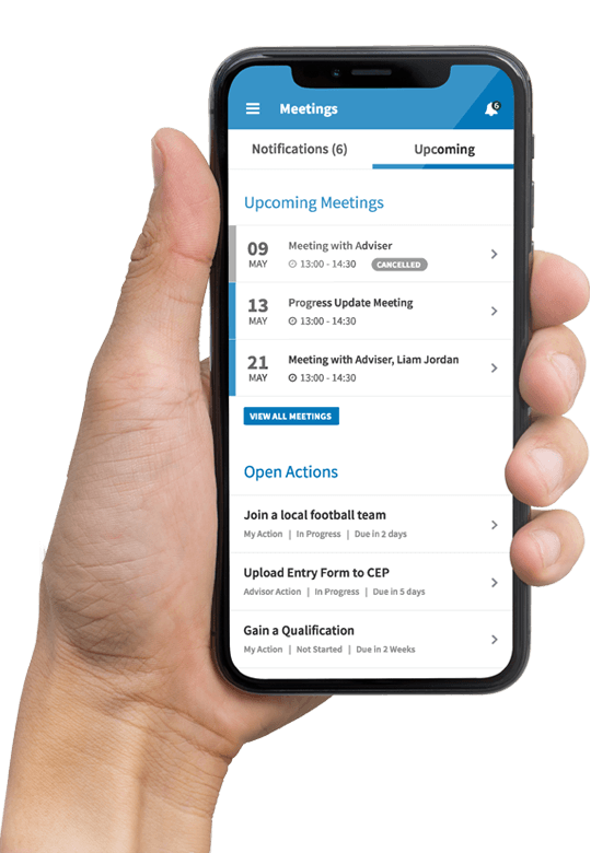 Hand holding smartphone with list of meetings displayed on screen